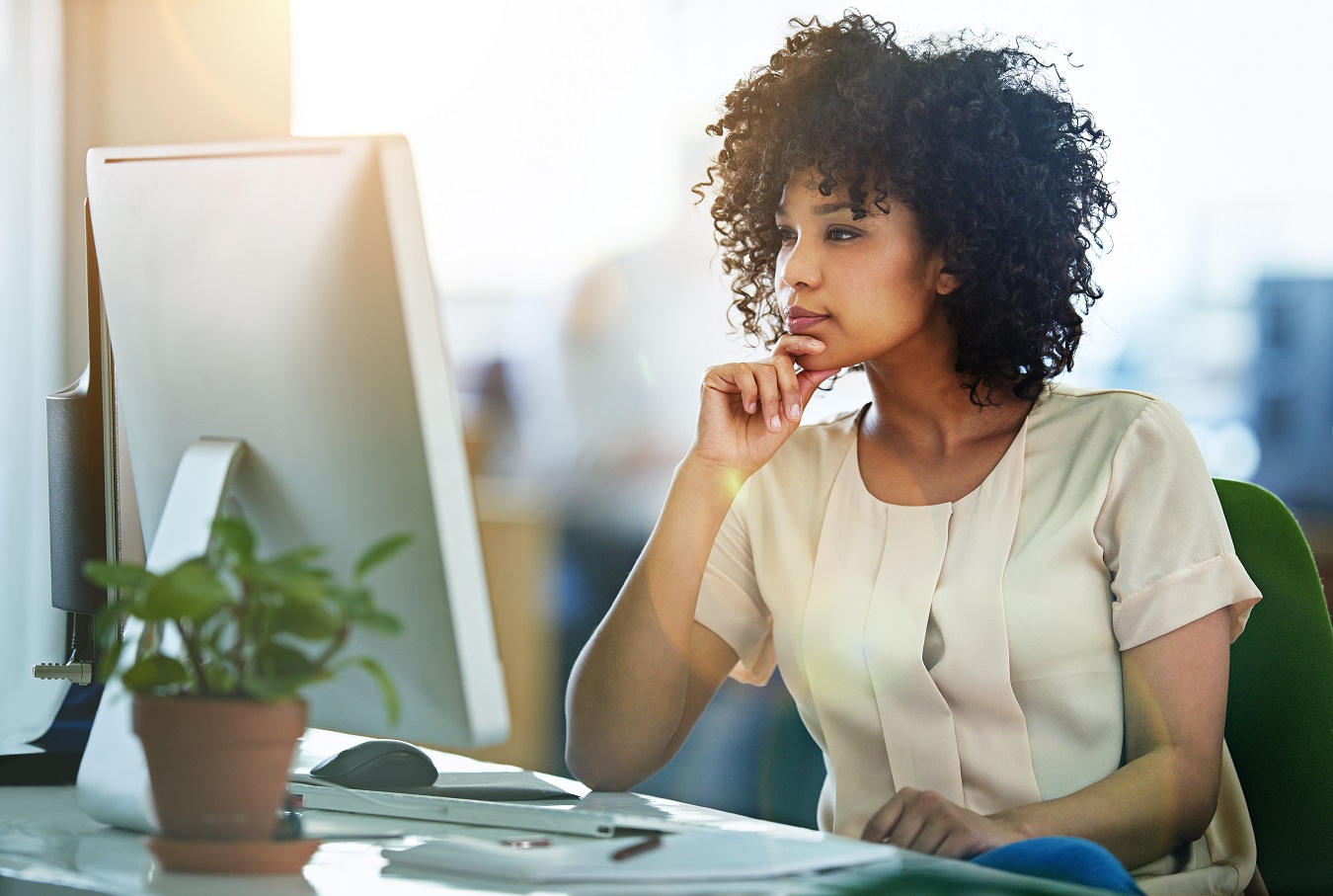Woman Looking at Laptop
